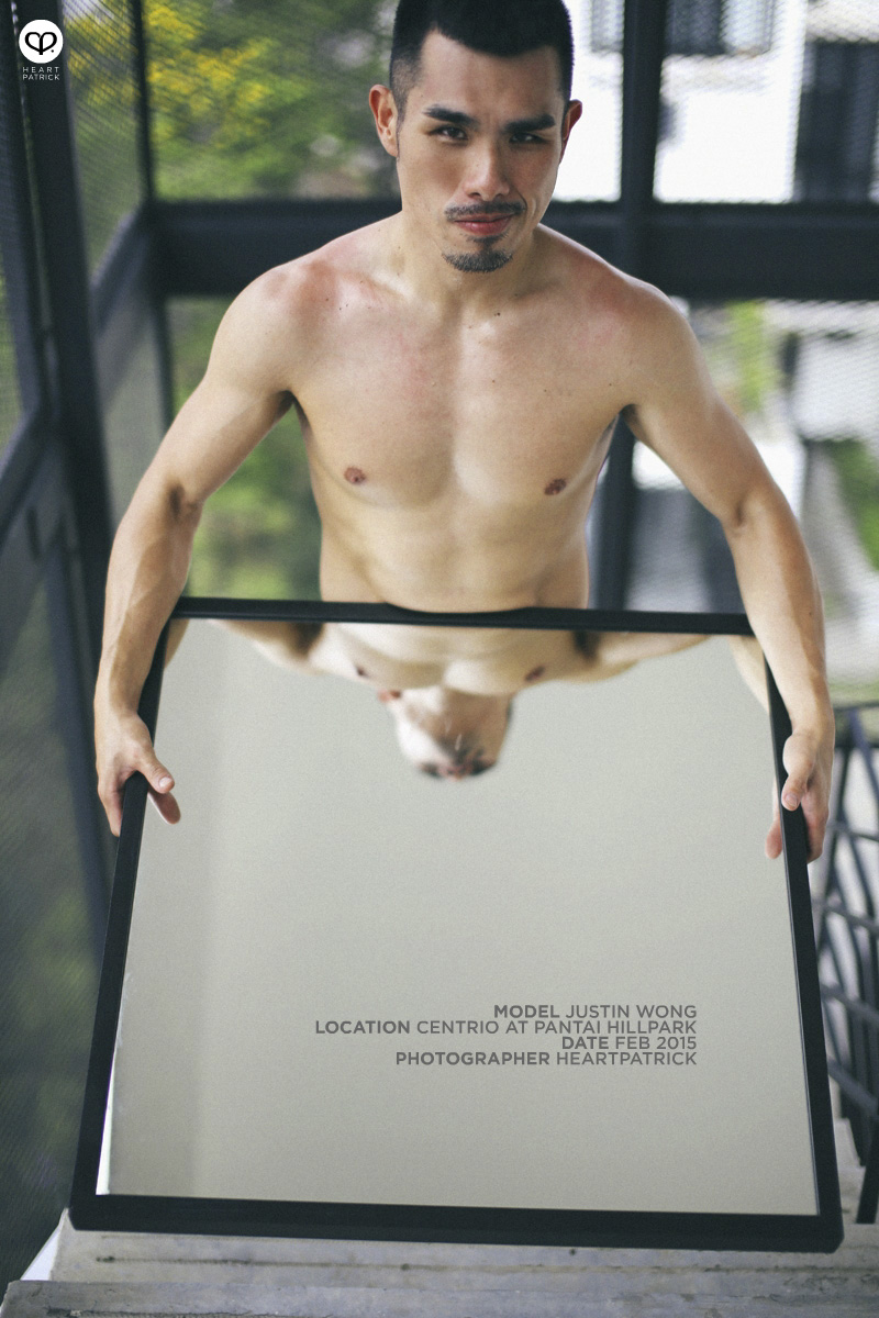 asian male creative portrait with mirror and trunks