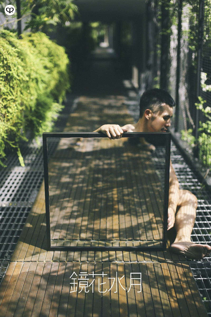 asian male creative portrait with mirror and trunks