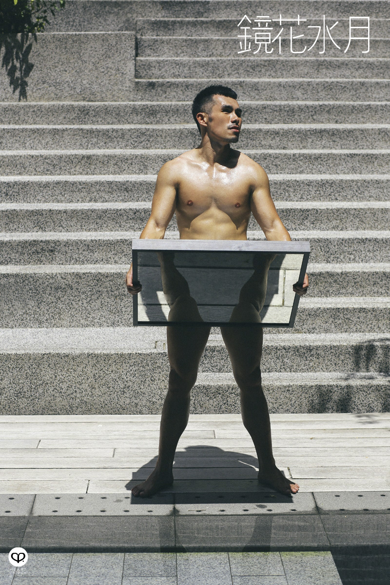 asian male creative portrait with mirror and trunks