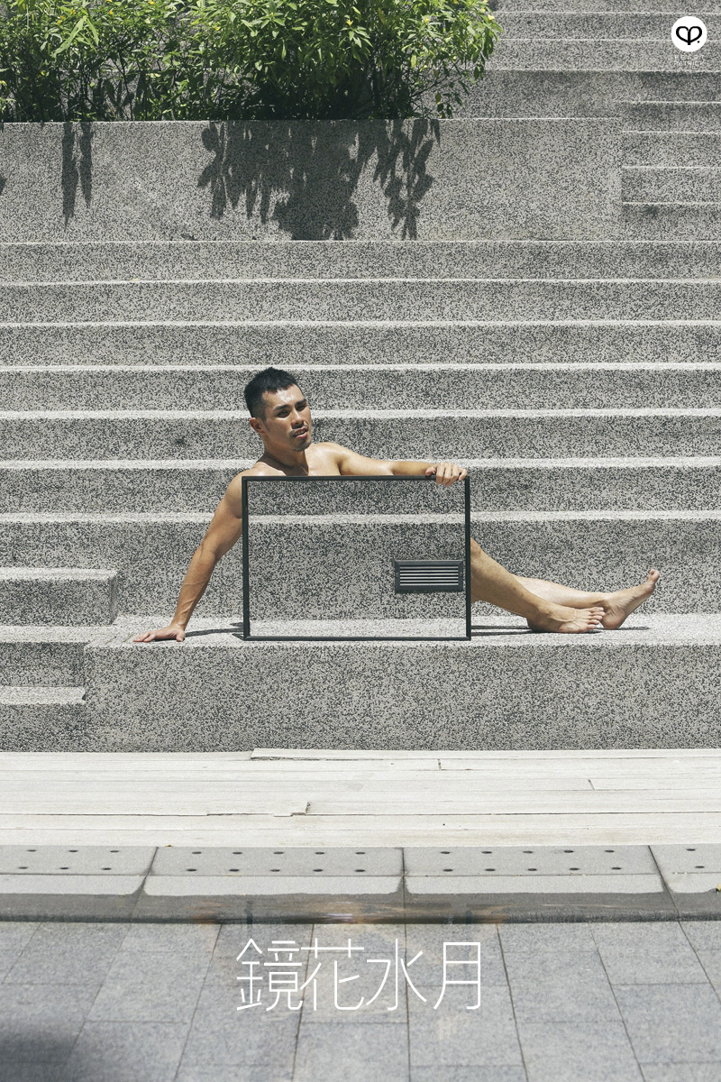 asian male creative portrait with mirror and trunks