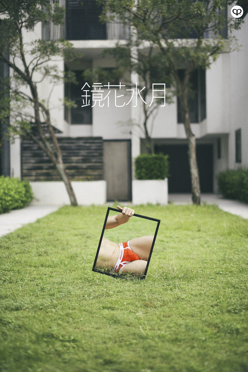 asian male creative portrait with mirror and trunks