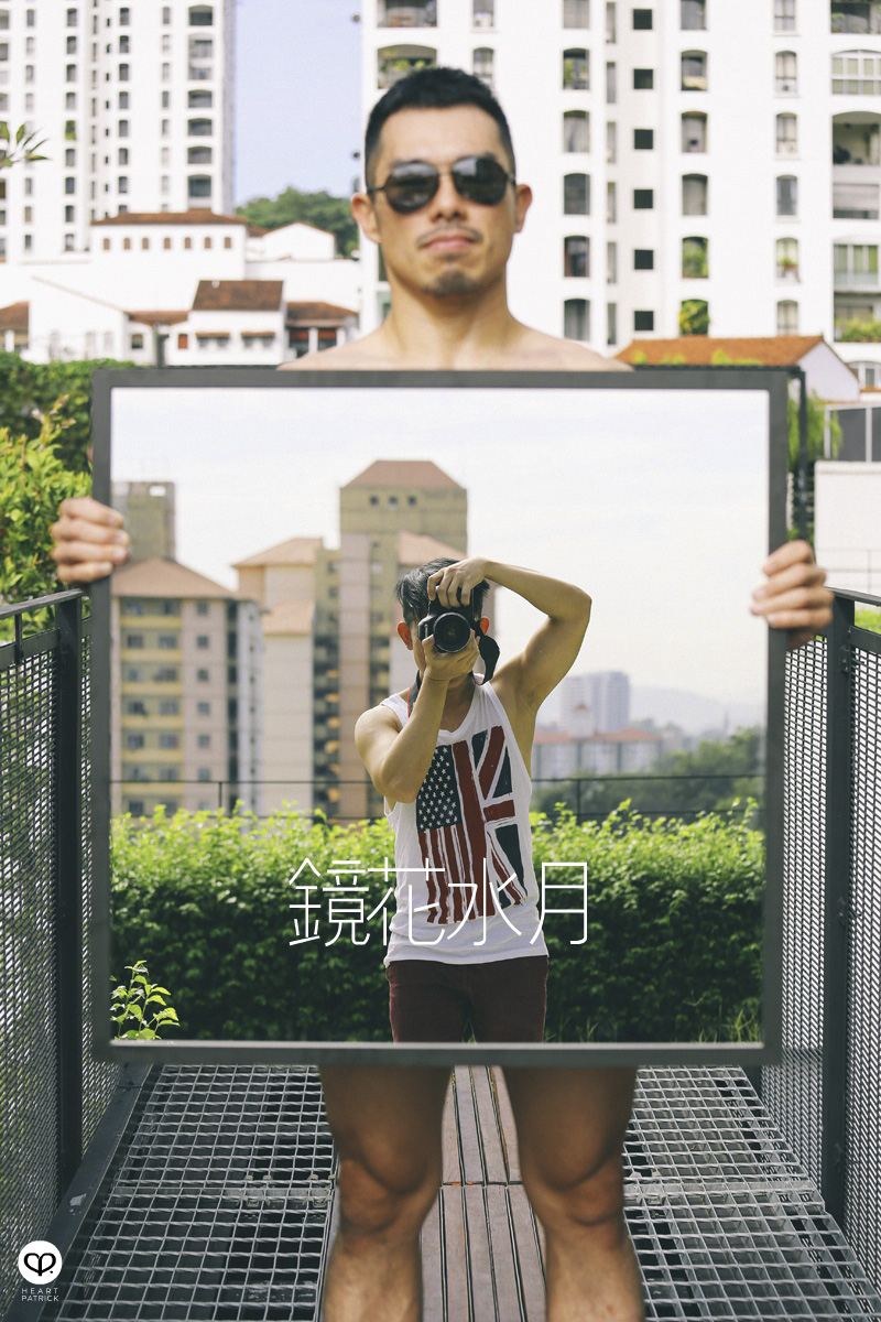asian male creative portrait with mirror and trunks